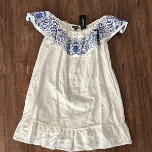 Off-Shoulder White Dress with Blue Floral Design